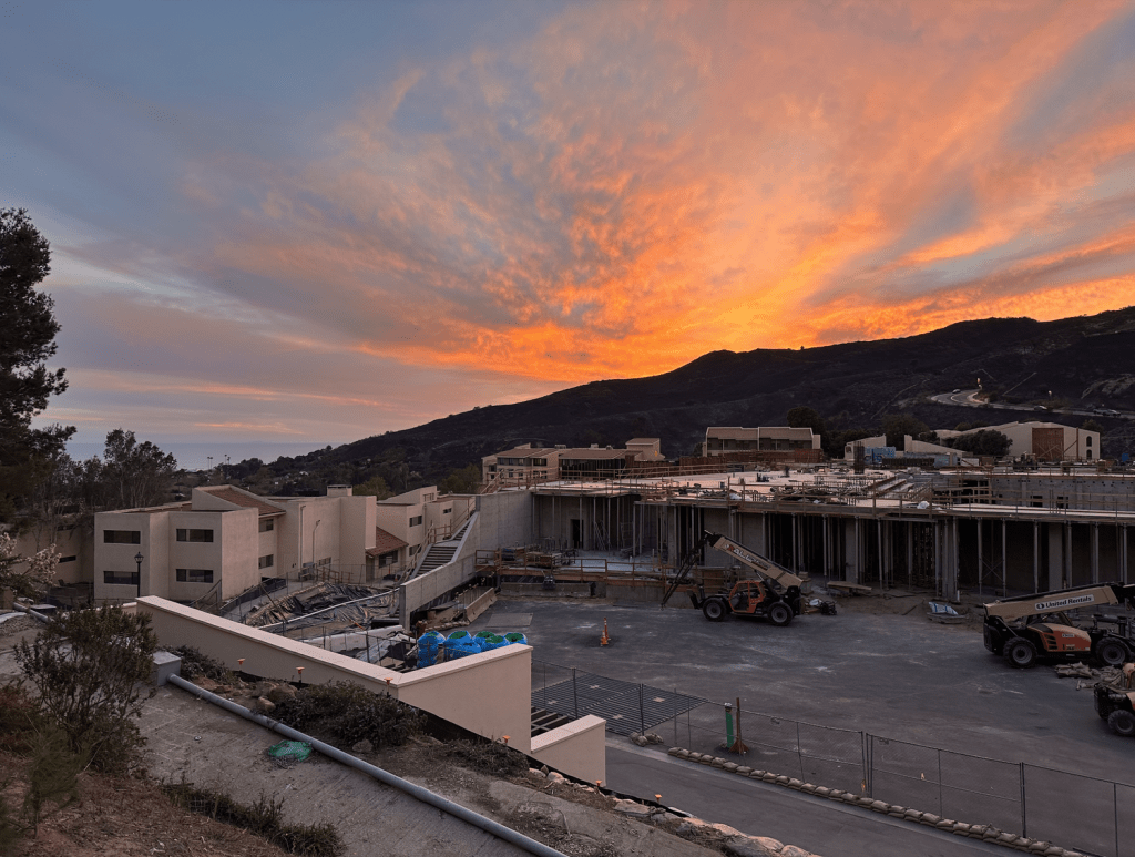 The sun sets behind the burned hills. Students were able to return to campus with a valid Pepperdine ID.